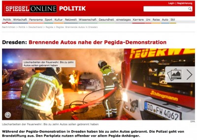 "Brennende Autos nahe der PEGIDA-Demonstration" (Screenshot: SPIEGEL ONLINE)